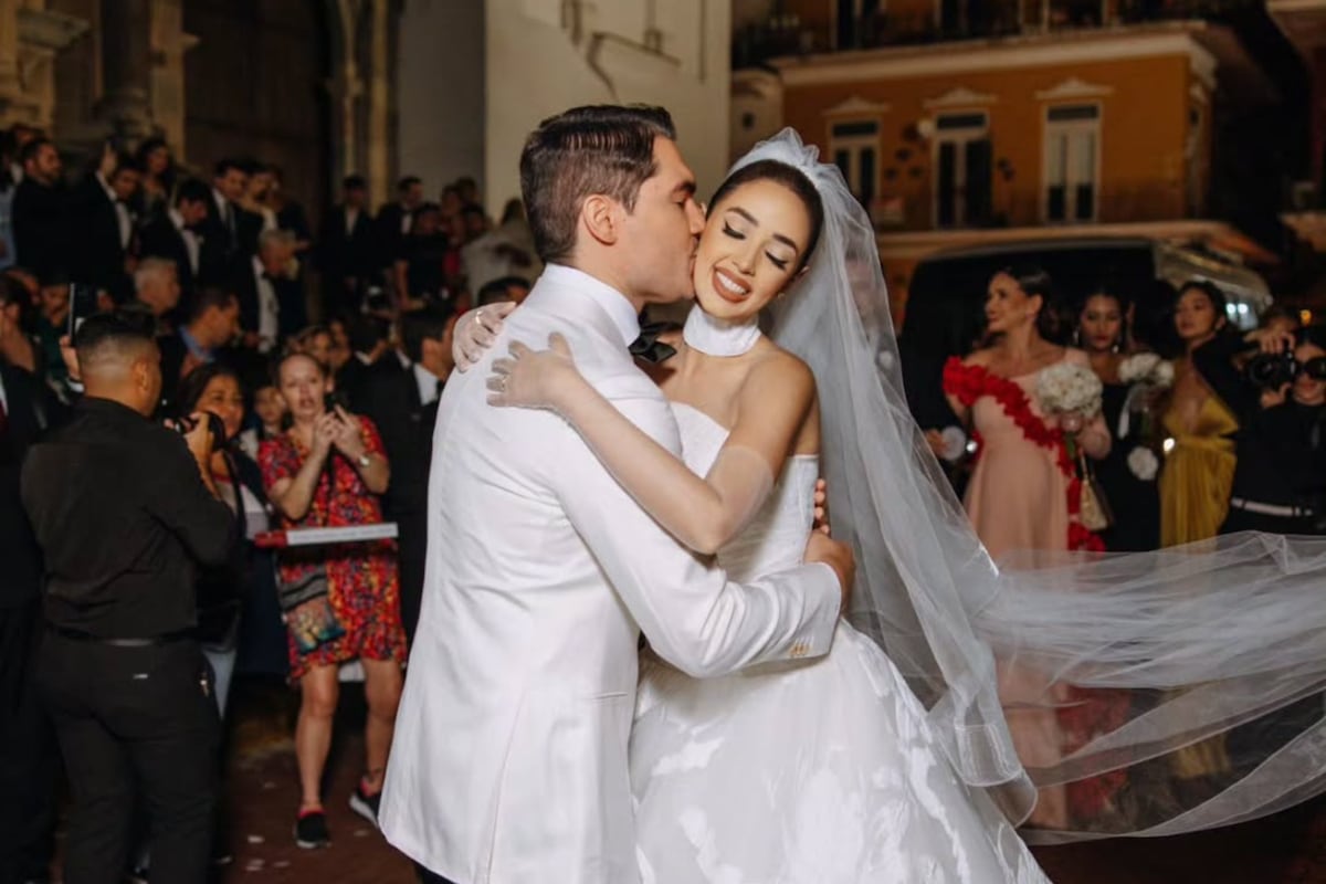 Un pastel decorado con 66 rosas y tres vestidos de novia: la boda de Dayana y Gio 